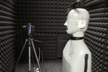 A manikin and camera set up inside of a WhisperRoom for product testing by Verizon Wireless