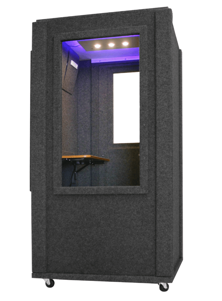 WhisperRoom's Office Booth shown from the rear with the light on and desk shown through a large window.