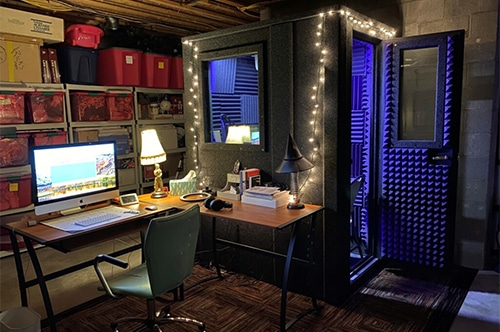 A WhisperRoom recording booth set up in a basement studio. 