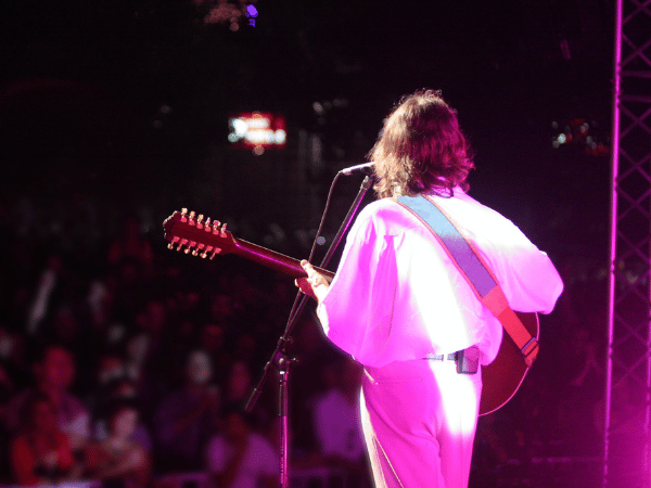 A musician playing a concert while on tour