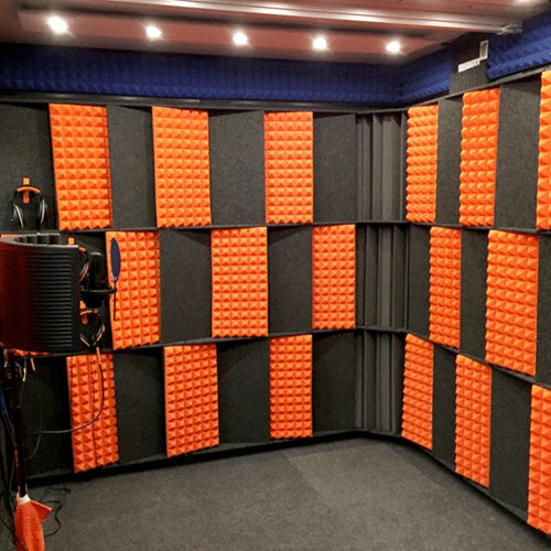 The Acoustic Tuning Package (ATP) is shown with orange foam inside of Harbor Springs Middle School Music Lab.