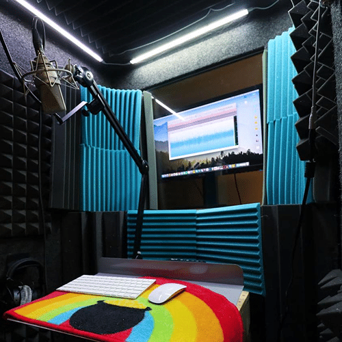 Voiceover actor Lauren McCullough's recording setup is shown from the inside of her WhisperRoom MDL 4260 S.