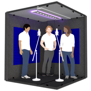 Three people and two microphones inside the MDL 7272 illustrate the 6' x 6' interior size of the booth.