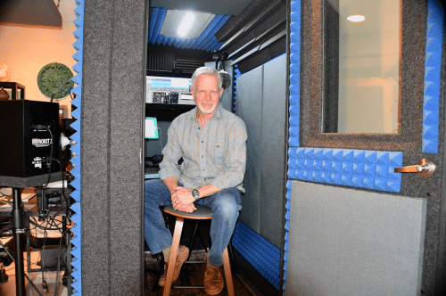 Voice Actor Todd Stark sitting inside of his WhisperRoom MDL 4872 S.