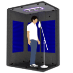 Featured Image for WhisperRoom Sizing shows a man standing next to a microphone in a WhisperRoom sound booth.