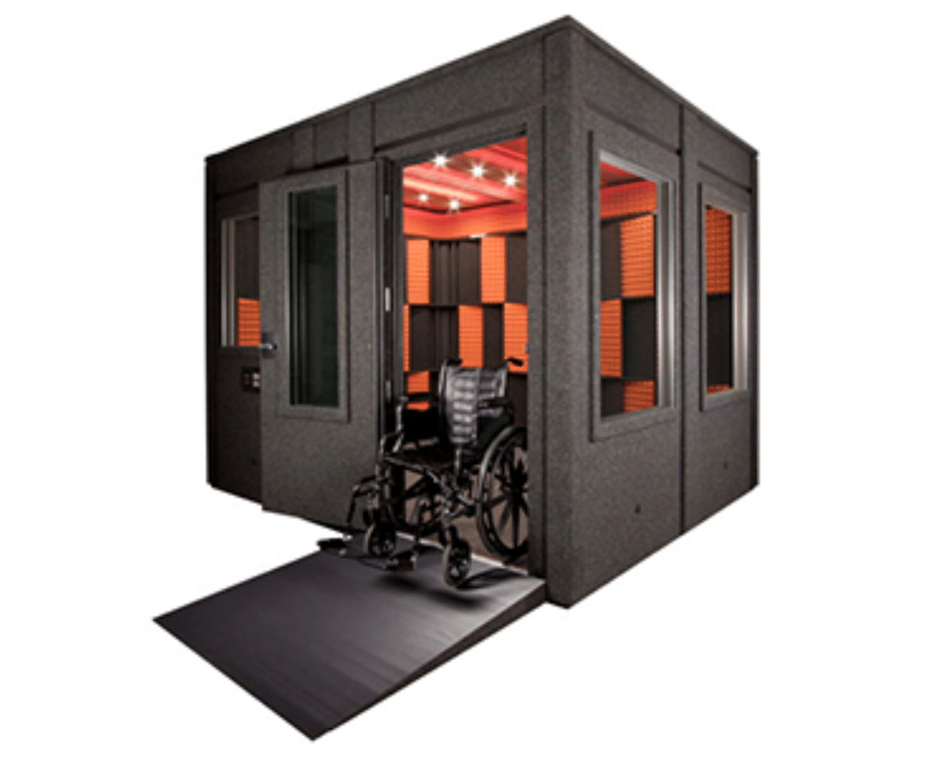 Image showcasing a spacious WhisperRoom equipped with the ADA Package. The photograph features a wheelchair on the ramp and highlights the wide access door, emphasizing inclusivity and accessibility for all users.